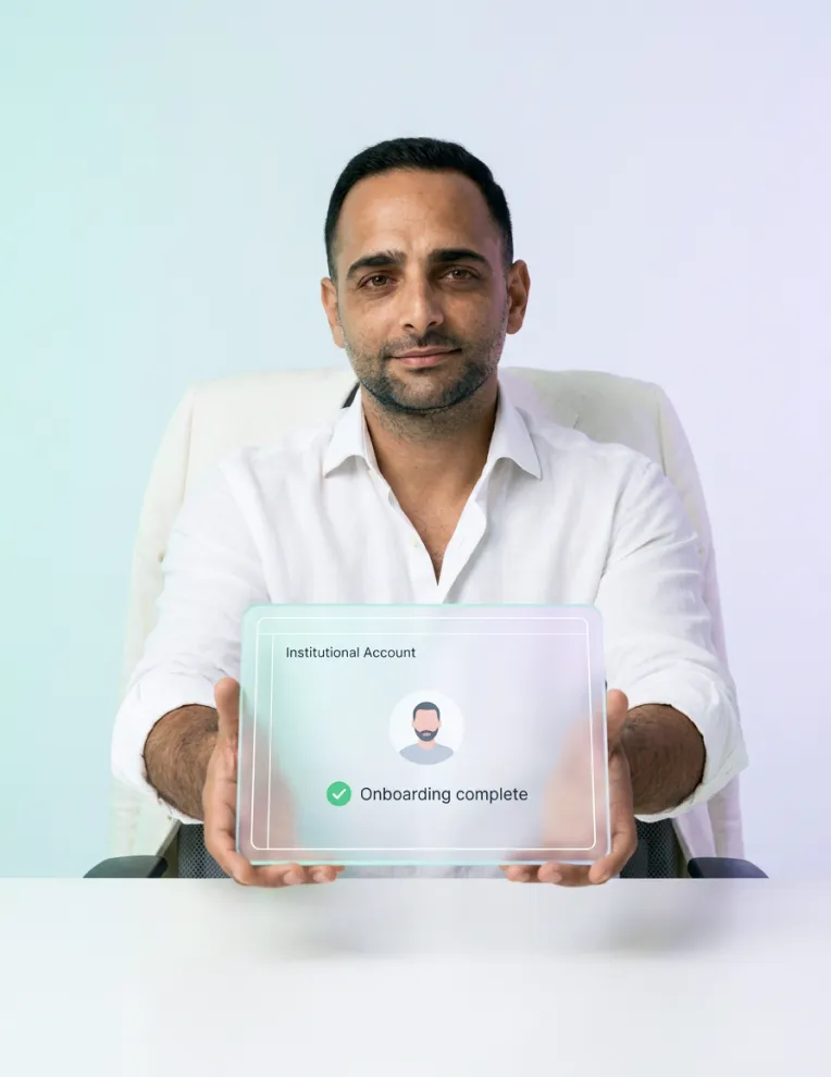 An XBO team member holding a translucent panel that reads Institutional Account, Onboarding complete